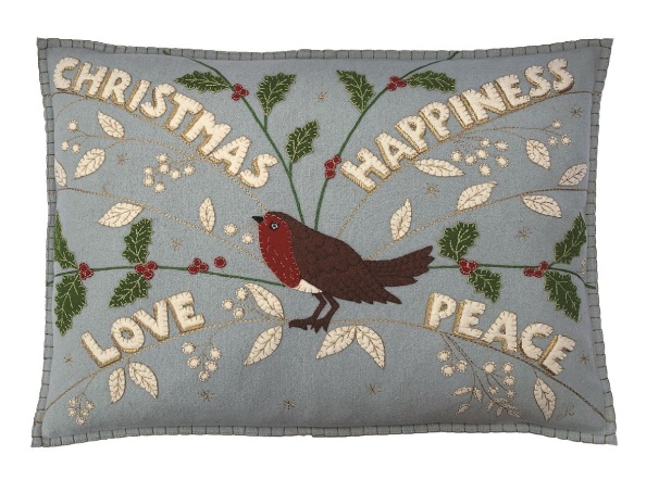 A pillow with a bird on it

Description automatically generated